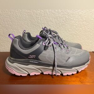 Skechers Women's D’Lux Journey Sneakers with Air-Cooled Memory Foam.